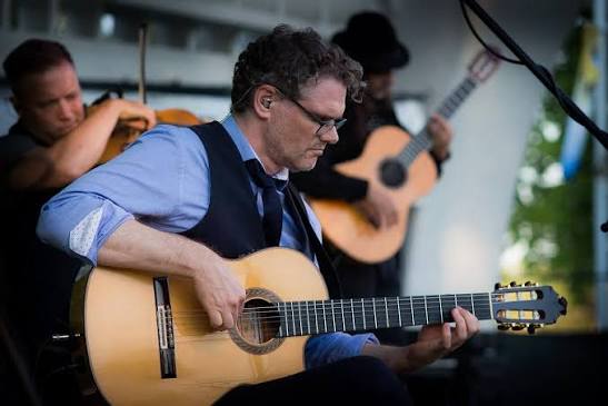 Jesse Cook performing on tour